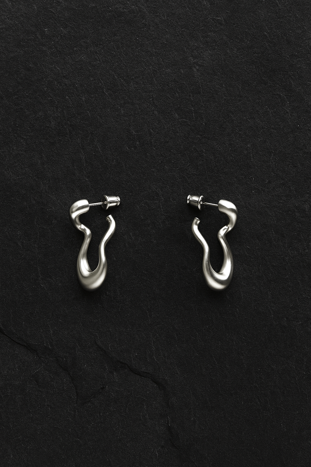 Close-up twirling earrings – 3d printed jewellery by nood